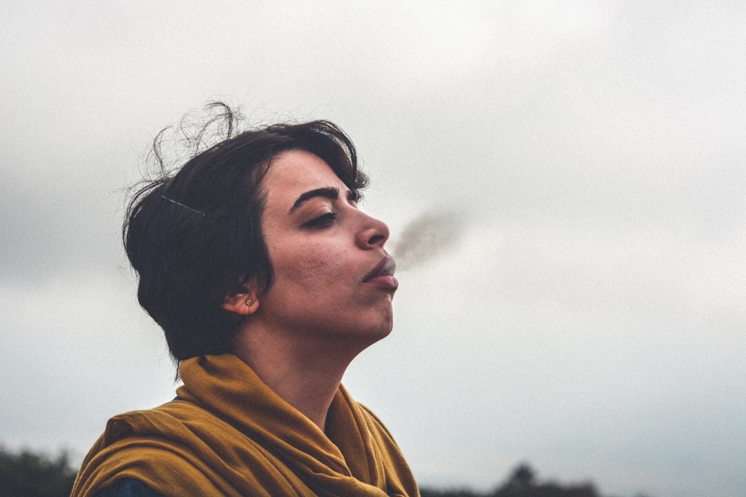 person practicing breathing exercises