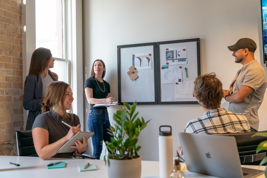 person presenting ideas to team