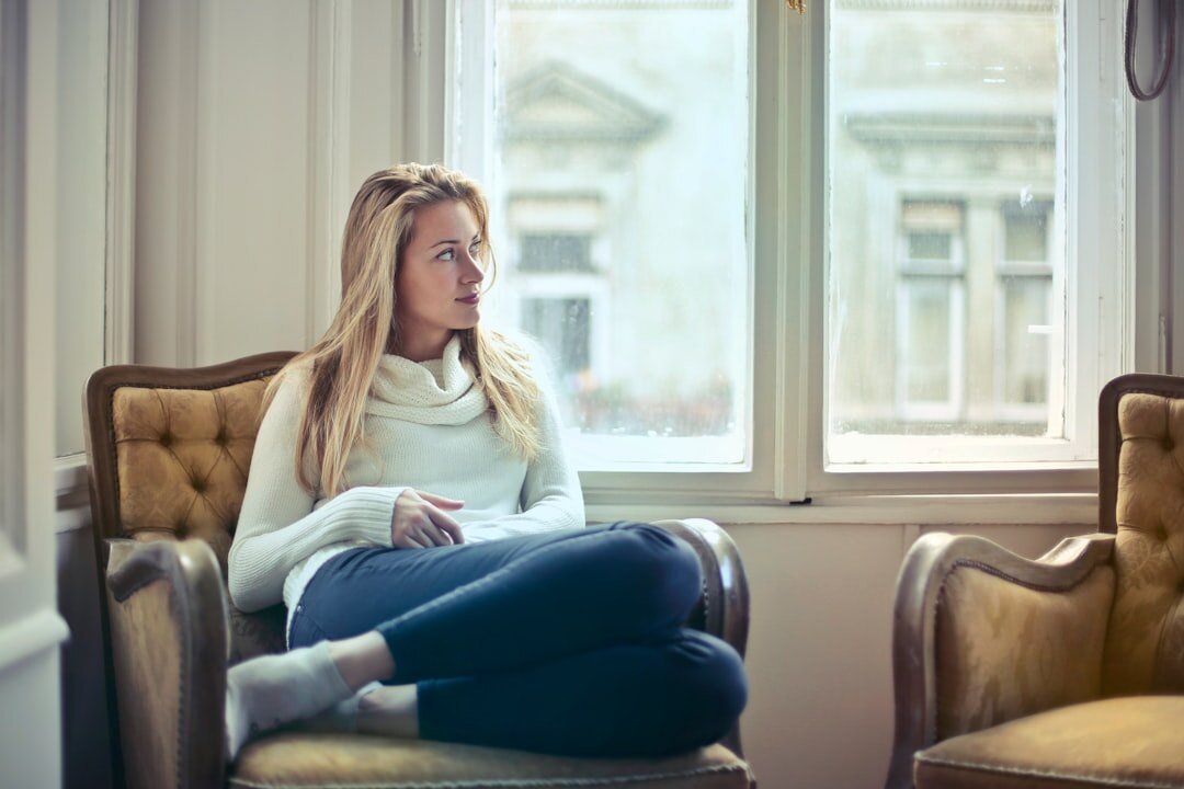 woman reflecting alone